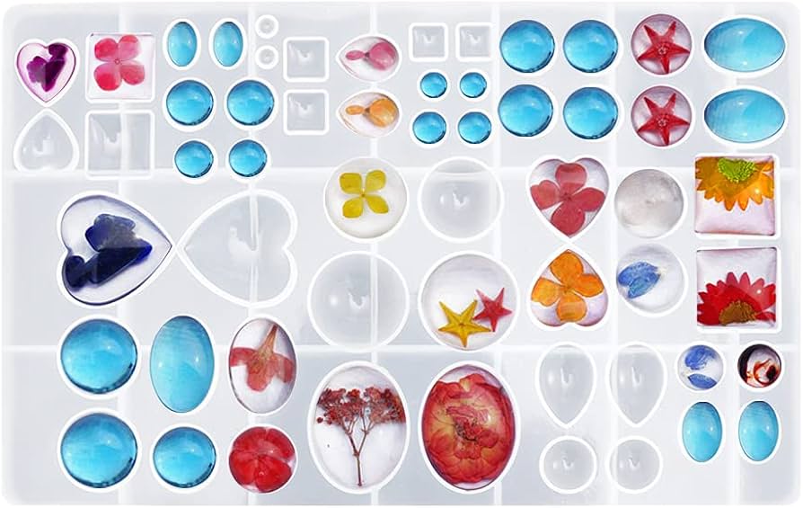 A photograph of a clear silicone mold filled with freshly poured resin on a workbench, with visible small bubbles trapped near the edges